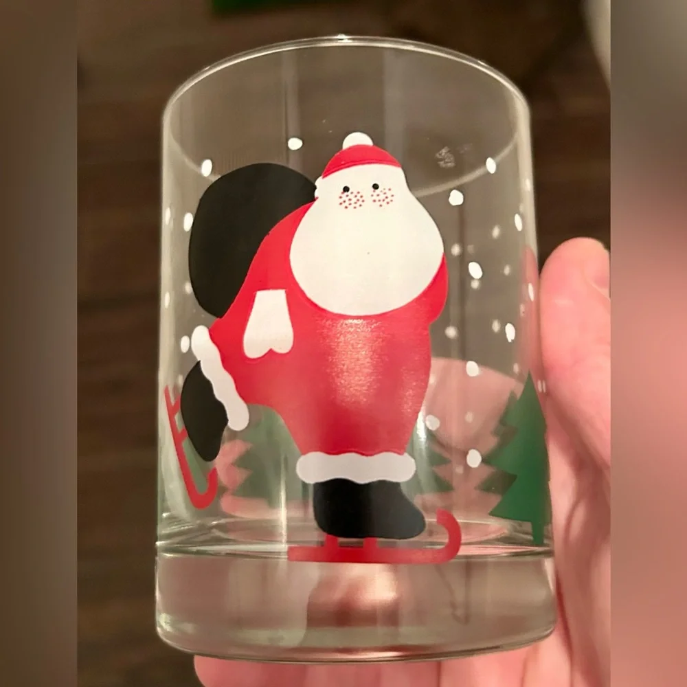 8 Crate & Barrel vintage skating Santa lowball glasses. 12oz